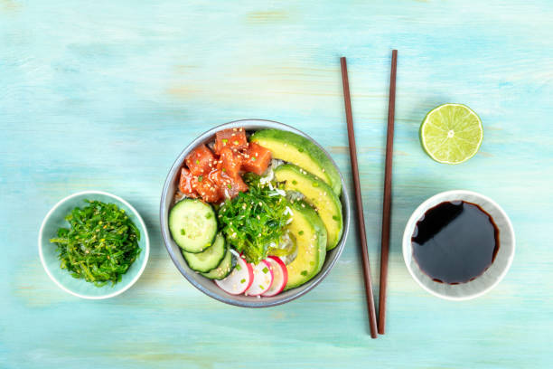 istock Hawaiian tuna poke salad with wakame and copy space 962114384