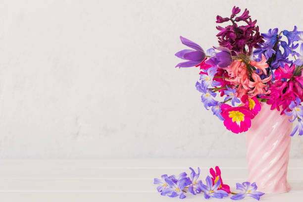 beautiful spring flowers in pink vase