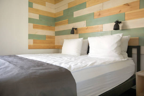 istock Comfortable bed in stylish bedroom 962118374