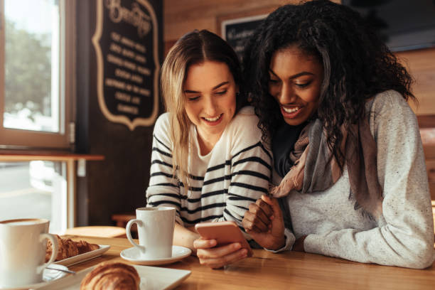 istock Friends sitting in a cafe 962119546