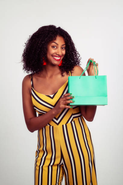 istock Happy woman showing her gift. 962130570