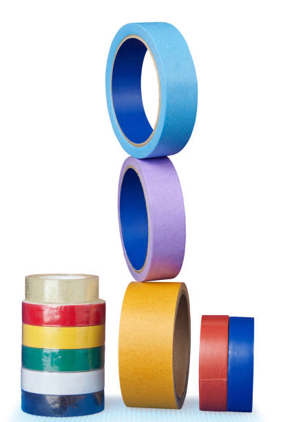 istock Multi-colored rollers of adhesive tape on  white background. 962131306
