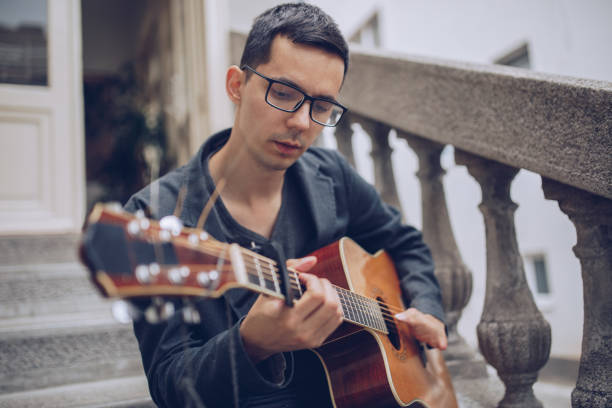 istock Man loves guitar 962131308
