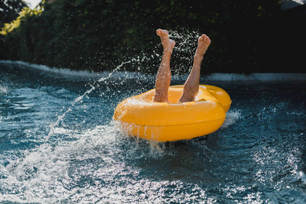 プールで水に落ちる男 - swimming trunks swimwear summer bikini ストックフォトと画像