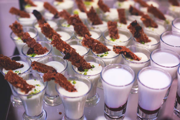 istock Beautifully decorated catering banquet table with different food snacks and appetizers on corporate christmas birthday party event or wedding celebration 962140362
