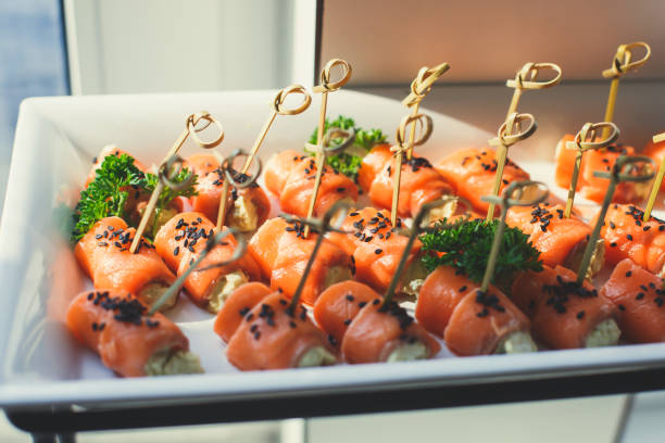 istock Beautifully decorated catering banquet table with different food snacks and appetizers on corporate christmas birthday party event or wedding celebration 962140656