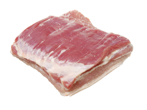 istock Belly pork uncooked isolated on a white background 962141360