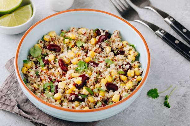 istock Quinoa salad with sweet corn, black beans and cilantro. 962141686