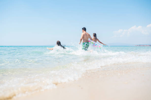 istock Young people at the beach 962141838