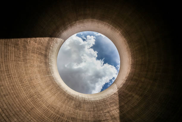 istock View up a coal burning power plant cooling tower 962142058