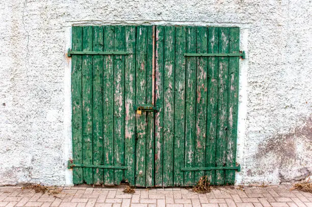 Photo of Old green wooden gate