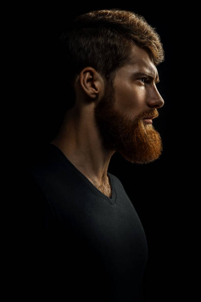 istock Portrait of young handsome bearded man looking forward 962152446