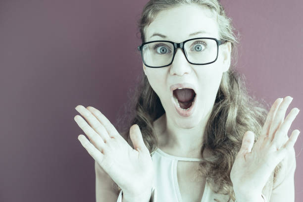 istock Surprised Middle-aged Woman Spreading Hands 962156490