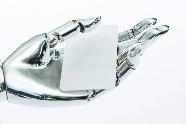 istock Robot's hand holding a empty business card 962161700