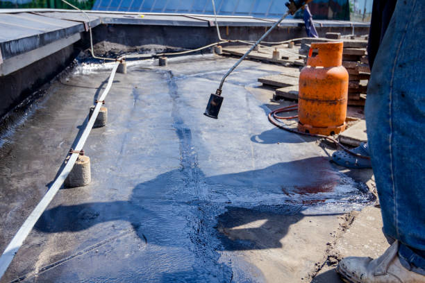 istock Roofing installation resin with propane blowtorch using a gas burner 962161940