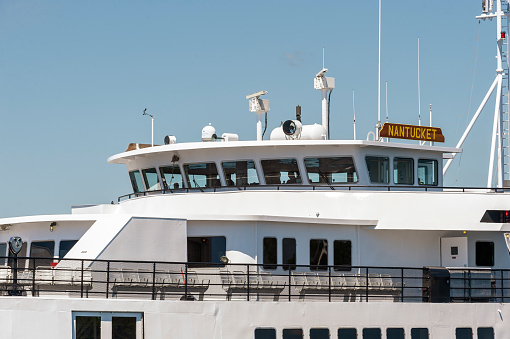 Fairhaven, Massachusetts, USA - May 21, 2018: Bridge of passenger/vehicle ferry Nantucket as it approaches hurricane barrier on its way to sea trials in Buzzards Bay