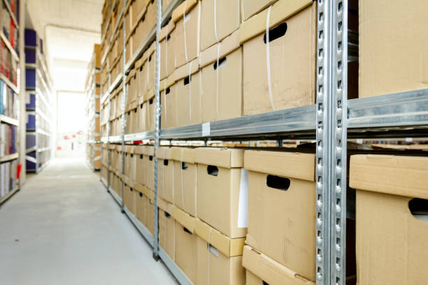 Office file folders, Stack of documents in cardboard box, Bureaucracy Stacks of files and paperwork placed in bookshelves with folders and documents in cardboard box archive, storage room. document storage stock pictures, royalty-free photos & images