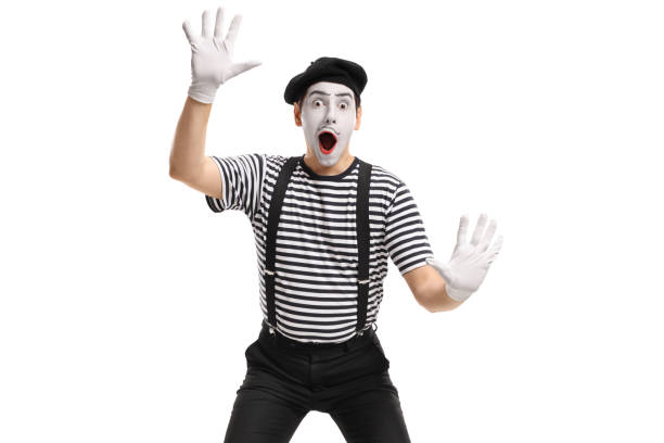 istock Mime holding his hands against an invisible wall 962174564