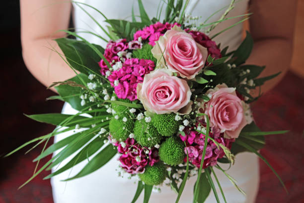 istock bridal bouquet held by the bride 962174996