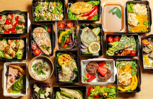 istock A lot of cardboard boxes with food 962178694