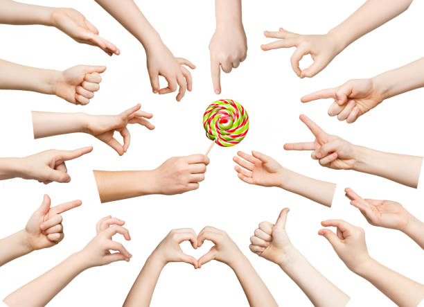 Set of child hands showing symbols