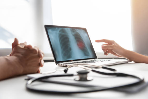 istock Female Doctor discussing with senior man patient. 962181636