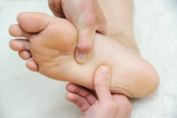 istock Massage of feet and legs. 962181810