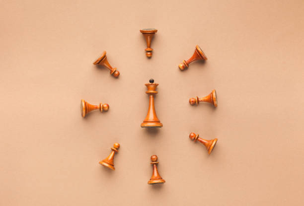 istock Wooden chess clock on beige background 962182226