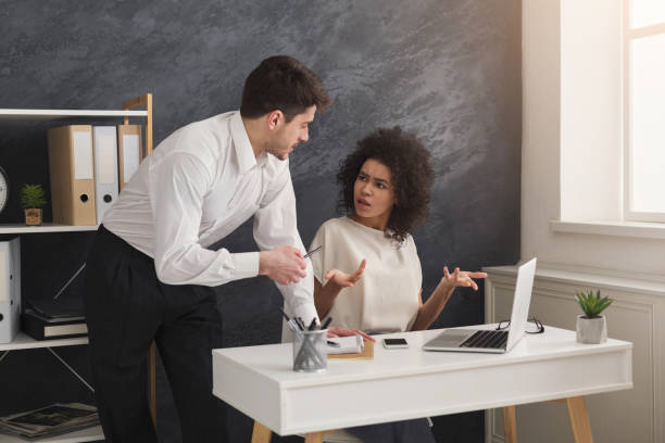 istock Couple of business partners work at modern office 962186930