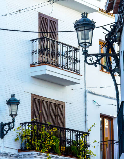 istock Stylish balcony with a metal railing, solid architectural element, a place of rest and relaxation, vintage decor 962190406