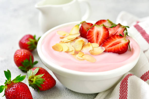 istock Natural strawberry yogurt with fresh berry and mint 962190840