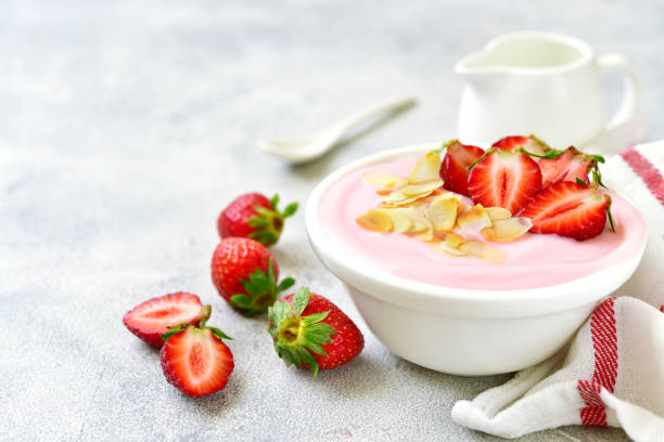 istock Natural strawberry yogurt with fresh berry and mint 962190842