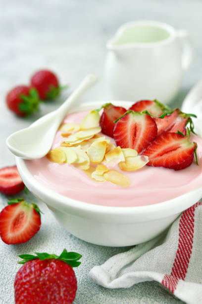 istock Natural strawberry yogurt with fresh berry and mint 962190890