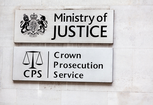 London, United Kingdom - April 26, 2018: Plate at the entrance of the UK Ministry of Justice. The Ministry of Justice is a ministerial department of the UK Government who is responsible for improvements to the justice system.