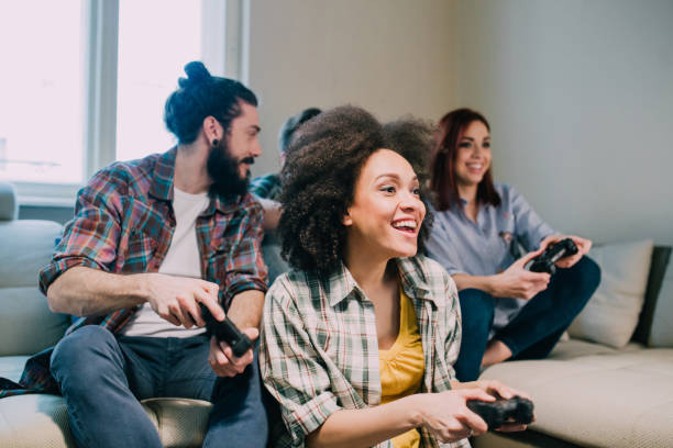 istock Friends playing video games on TV 962192368