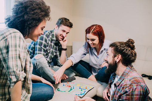 Group of people playing board games together