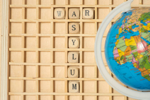 istock A Globe, Wooden Letters and Words War and Asylum 962197416