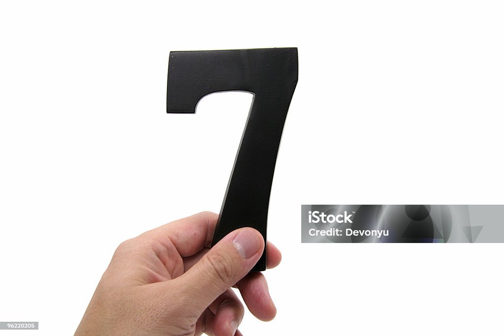 hand holding number 7  Black Color Stock Photo