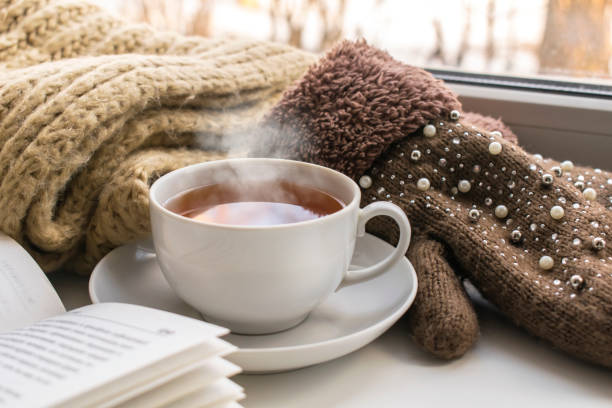 istock A mug of hot coffee on the window 962202346