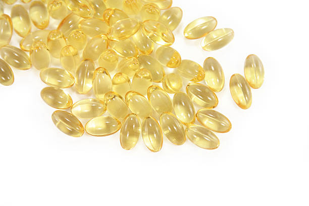 wiązanka żółty opakowania leków - vitamin pill capsule pill echinacea zdjęcia i obrazy z banku zdjęć