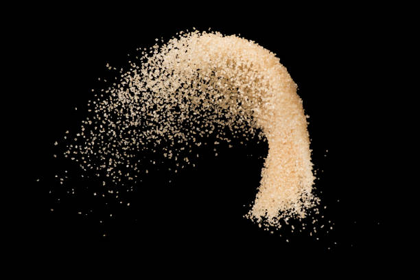istock Brown sugar splash isolated on black background  ,throwing freeze stop motion element food and drink object design 962208072