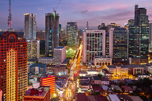 Aerial view at night of Makati,,business district of Metro Manila, Philippines.