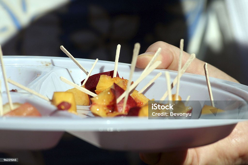 people sampling peach  Food Stock Photo