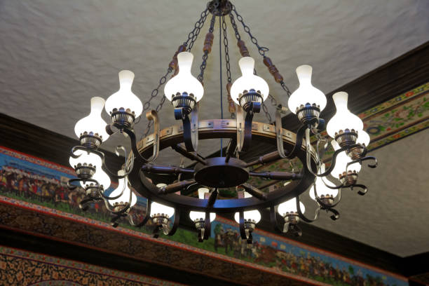 istock Luxury expensive lamp chandelier hanging under ceiling in palace. 962215756