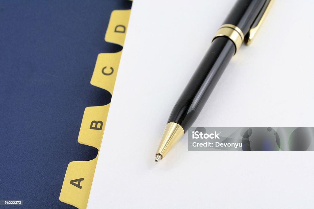 yellow file divider and pen  Ring Binder Stock Photo