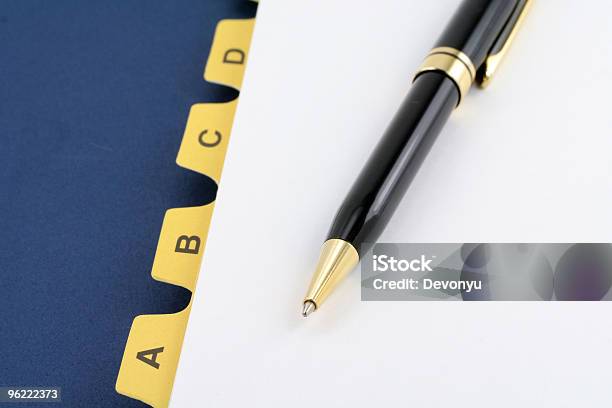 Yellow File Divider And Pen Stock Photo - Download Image Now - Ring Binder, Address Book, Alphabet