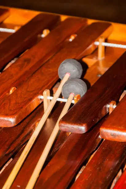 Photo of Close-up shot of a marimba or Hormigo keyboard. Guatemala. National instrument of Guatemala made with Hormigo wood the marimba keyboard.