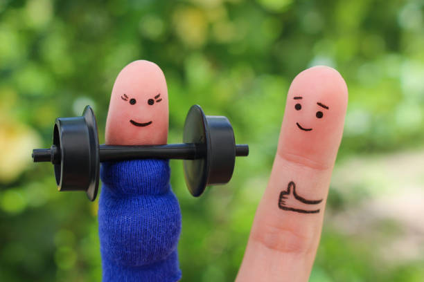 fingers art of happy couple. concept of pregnant woman doing sports and man supports her. - mother exercising baby dieting imagens e fotografias de stock