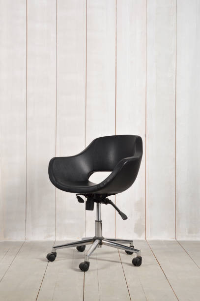 istock Office Chair on Wood Background 962226776