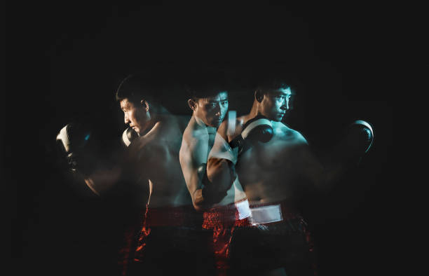 несколько экспозиций для азиатских китайских мужчин с боксерскими перчатками - boxing macho men human muscle стоковые фото и изображения